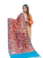 Woman holding heavy work Kashmiri Shawl azure blue color KS663